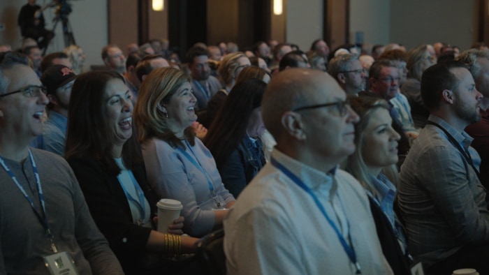 Audience enjoying Chad E. Foster keynote presentation