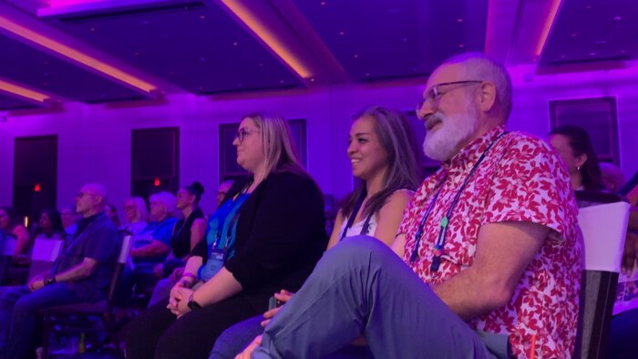 Chad E Foster engaging laughing audience at Vegas CMP conference