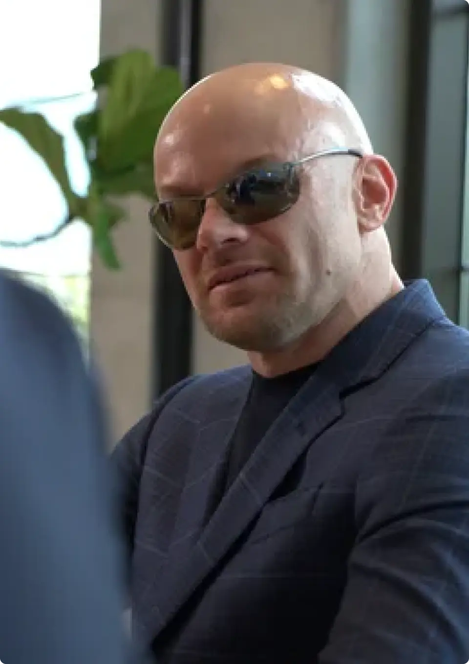 Chad E. Foster in a strategic meeting